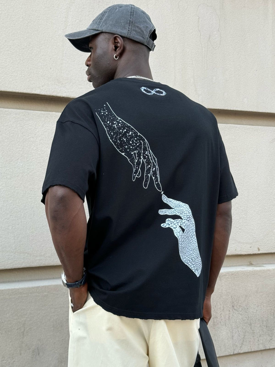 Model wearing the black Past x Future tee, back print